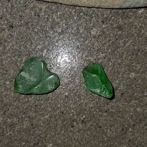 Dark green sea glass